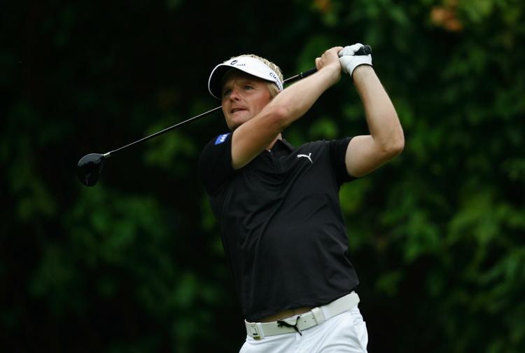 Fremgang. Søren Kjeldsen på tredje hul under gårsdagens runde i Singapore. 