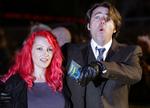 Jonathan Ross, der her ses sammen med sin hustru, Jane Goldman, er topscoreren, når det handler om lønninger hos BBC: 50 millioner kroner om året, (Arkivfoto) 