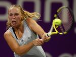 Mindre tennis. Fra at have spillet 26-27 turneringer i 2009, kommer Wozniacki kun på banen i 16-18 turneringer i 2010. (arkivfoto) 