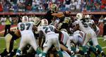 blokering. Robust forsvarszone hos Miami Dolphins. Se om Carolina Panthers kan bryde igennem denne mur i aftenens NFL kamp. 