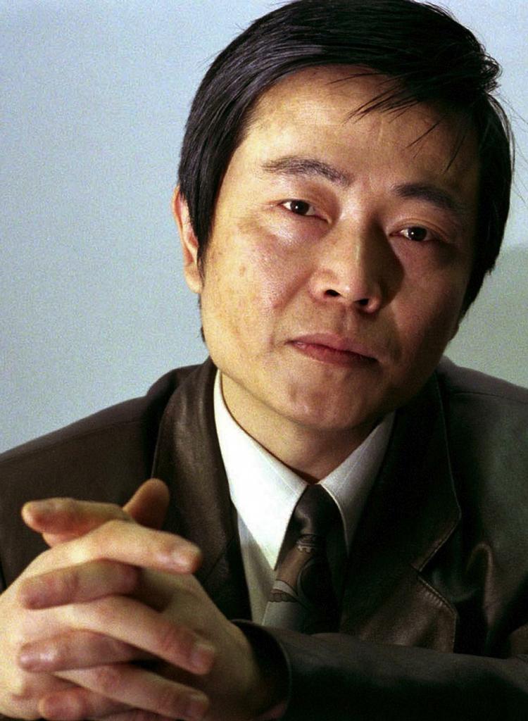 Dømt. Huang Qi har fået tre års fængsel for at besidde statshemmeligheder. Retten fortalte ikke hvilke. 
