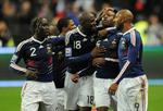 PENGEREGN. William Gallas' afgørende scoring mod Irland sendte Frankrig til VM og millioner af kroner ned i spillernes lommer. 