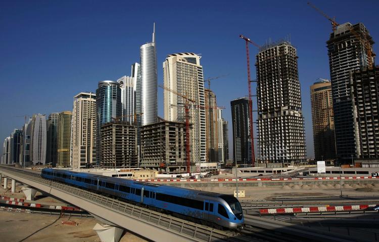 BYGGEBOOM. Dubai risikerer at stå med hundreder af ufærdige højhuse og ejendomme på grund af krisen. Arkivfoto. 