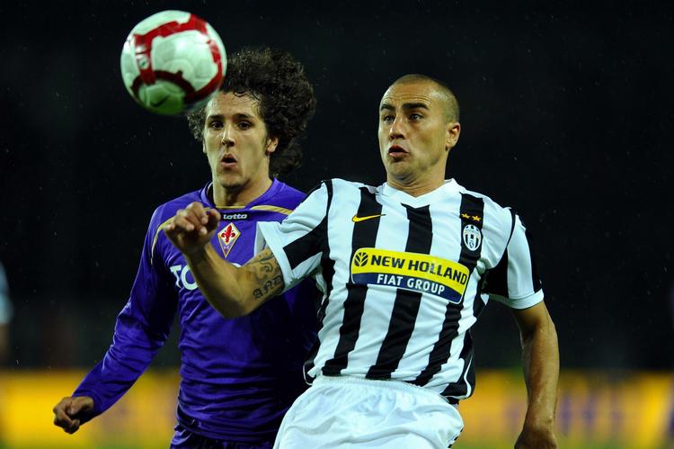 positiv. Fabio Cannavaro (th) slap nådigt fra en positiv doping-test i oktober. Nu er to af Juventus' læger i stedet blevet straffet. Arkivfoto. 