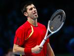Lettet. Serbiske Novak Djokovic sigter igen mod en semifinale efter en tosætssejr mod Rafael Nadal fra Spanien. 