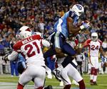 yderligt. Tennessee Titans Kenny Britt (18) fanger en aflevering til touchdown i de sidste minutter af kampen mod Arizona Cardinals. 