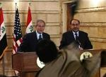 Angreb. Sådan så det ud, da Muntazer al-Zaidi kastede to sko efter George W. Bush. 