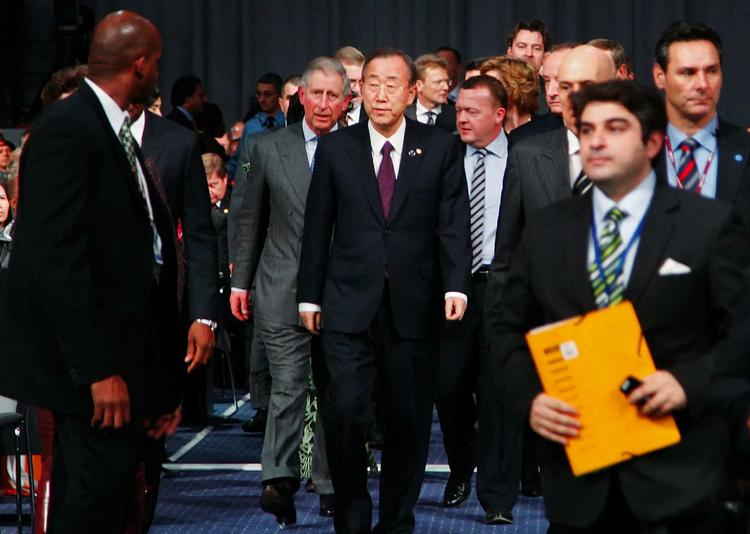 The United Nations Secretary-General Ban Ki-moon with Prince Charles and Denmark's Prime Minister Lars Løkke Rasmussen at the Bella Center yesterday. 