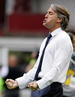 Vinder. Roberto Mancini gjorde Inter til pokalmestre i sin første sæson som træner. Året efter vandt han og klubben mesterskabet. 
