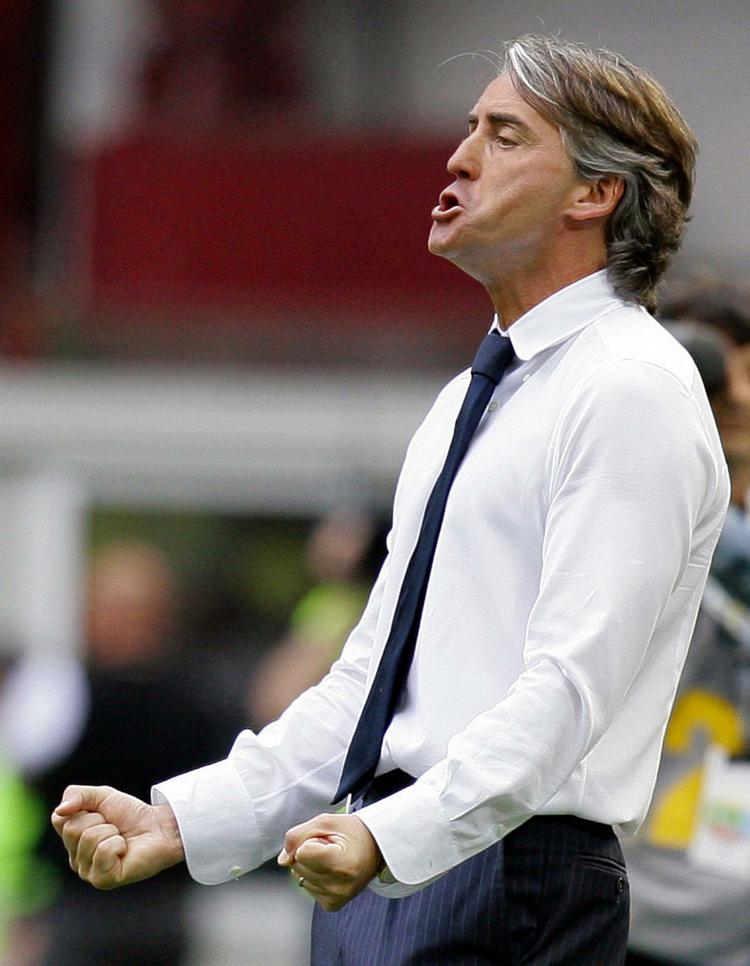 Vinder. Roberto Mancini gjorde Inter til pokalmestre i sin første sæson som træner. Året efter vandt han og klubben mesterskabet. 