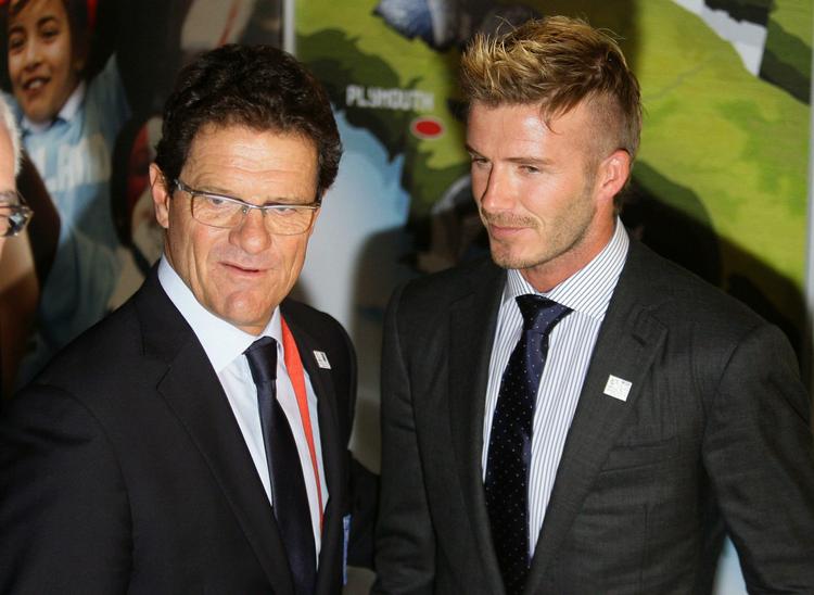 Duo. Capello og Beckham ved lodtrækningen til VM i Sydafrika for en måned siden. 