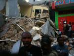 Katastrofe. Ruiner ses over alt i Haiti. Mange FN-soldater frygtes begravet i dem. 