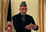 Forsoning. Afghanistans præsident Hamid Karzai vil tilbyde jobs og pension til talebankrigerne, for at få dem til at stoppe med at bekæmpe regeringen og de internationale styrker. (arkivfoto) 