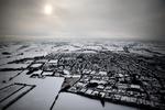 Vinter. Sådan har Danmark set ud fra luften gennem stort set hele januar. I weekenden kan der ventes mere sne, siger DMI. 
