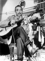 Opslidt. Django Reinhardt blev kun 43 år, men han havde trods sit korte liv en fantastisk karriere. Her er han fotograferet i 1953, kort tid inden sin død. 