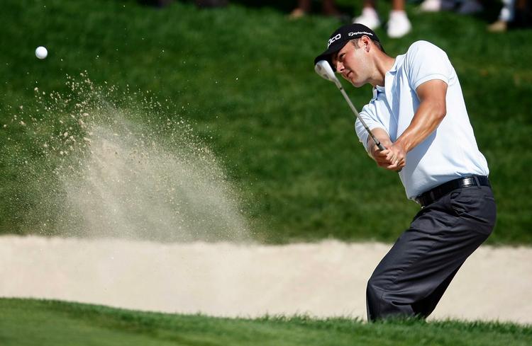vinderen. For anden gang vandt Martin Kaymer i Abu Dhabi, og dermed er den 25-årige tysker oppe på syv sejre på European Tour. 