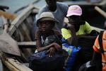 flugt. Haitianske flygtninge forsøger at sejle ud af landet, hvor nødhjælpen stadig kun når frem til et mindretal. Foto: Ariana Cubillos/AP 