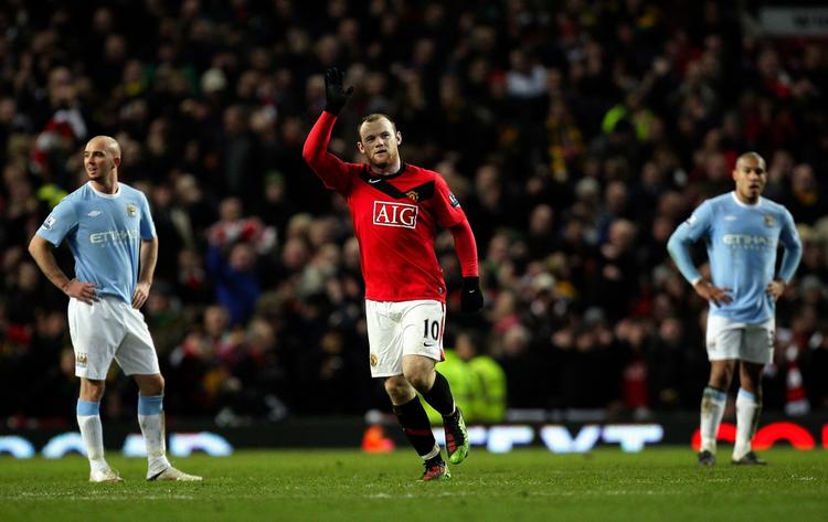 MÅL. Wayne Rooney fejrer en scoring i kampen mod Manchester City. 