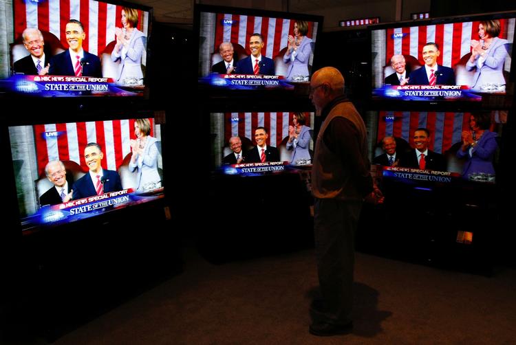 SOTU. Tv-skærme transmitterer Obamas State of the Union-tale, populært kaldet SOTU. 