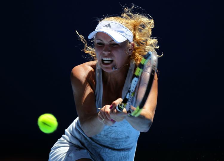 avancement. Selv om hun ikke kom til tops ved Australian Open, rykker Caroline Wozniacki ifølge AP frem til tredjepladsen på verdensranglisten. Arkivfoto. 