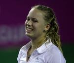 ydmyget. Caroline Wozniacki og makkeren Karina Ildor Jacobsgaard fik ikke et ben til jorden i damedoublen mod Sverige. 