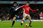 Hjem? Trods sine kun 22 år har Cesc Fabregas (til højre) allerede spillet over 200 kampe for Arsenal og 47 landskampe. Arkivfoto. 