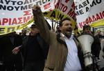 Demonstration. Taxachauffører protesterede i dag foran Finansministeriet i Athen i protest mod regeringens planer om højere benzinafgifter - et af midlerne til at få løst den økonomiske krise. 