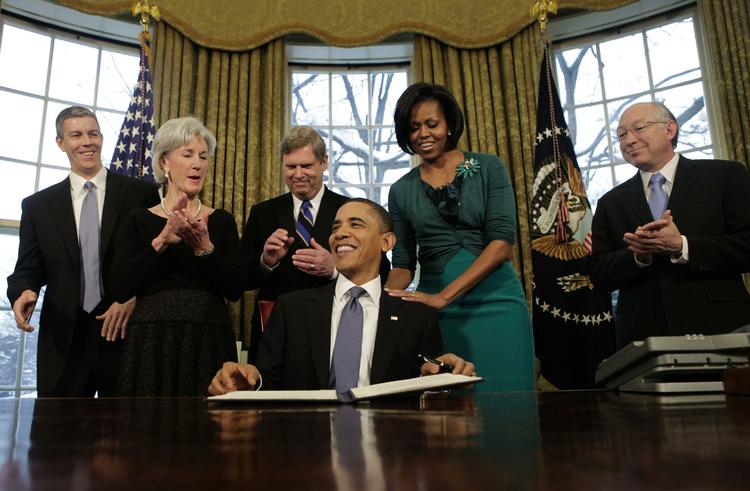 Til kamp mod fedmen. Barack Obama underskriver kampagnen, der skal gøre de amerikanske børn sundere. 