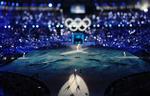 Den olympiske fakkel i centrum for begivenhederne. 