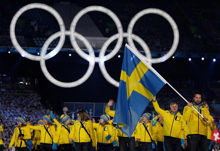 De blågule svenske farver lyser op under ceremonien. 