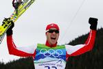 Triumf. Schweiziske Dario Cologna vandt olympiske guld, mens norske Petter Northug gik fuldkommen død. 