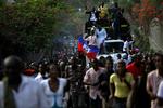 Alvorligt. Haitianere på gaden i Port-au-Prince i søndags i et optog uden fest og fuld af alvor. 