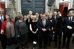 Prime Minister Lars Løkke Rasmussen's new cabinet emerging from the royal palace after being presented to Queen Margrethe II. 