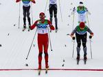 målfoto. Petter Northug krydser stregen foran Alex Teichmann og Johan Olsson efter 50 hårde kilometer på ski. 