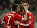 'Robbery'. Arjen Robben (til højre) og Franck Ribery jubler efter franskmandens afgørende scoring mod HSV. 