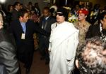 Gaddafi. Den tidligere leder af den Afrikanske Union ankommer her til et FN-møde i Addis Adeba i Etiopien med sit følge af kvindelige, militærklædte bodygourds. 
