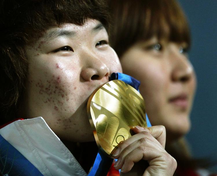 Guld. Zhou Yang er blevet irettesat af den kinesiske stat. Arkivfoto. 