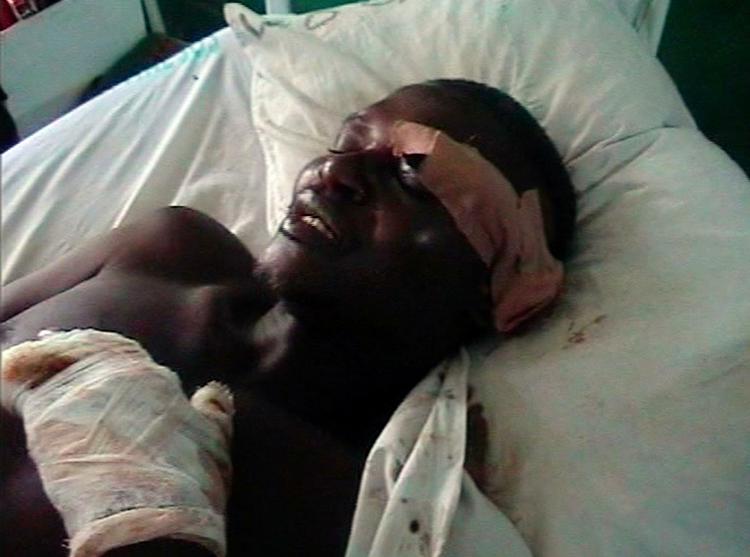 Massakre. Flere hundrede kristne nigerianere mistede livet i en massakre i går. Billedet viser en af de overlevende fra den landsby, der blev angrebet. 