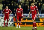 Nedtur. Skuffede Liverpool-spillere efter nederlaget til Wigan. 