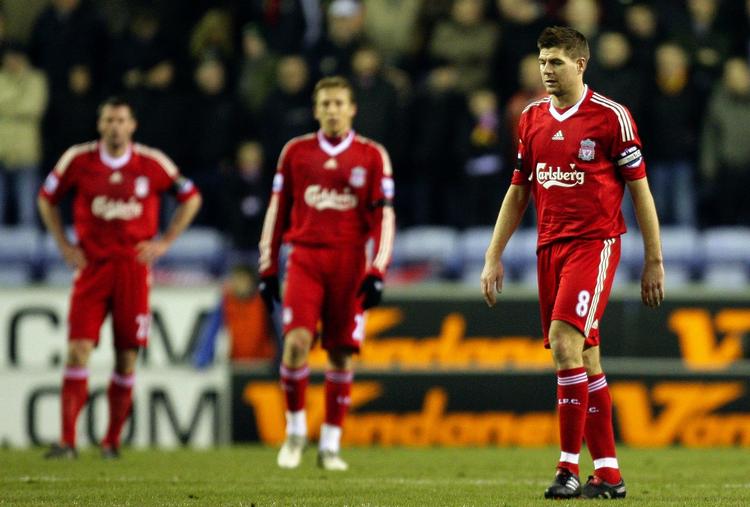 Nedtur. Skuffede Liverpool-spillere efter nederlaget til Wigan. 