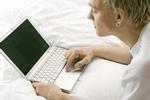 Man, laptop, data input, lie, Bed