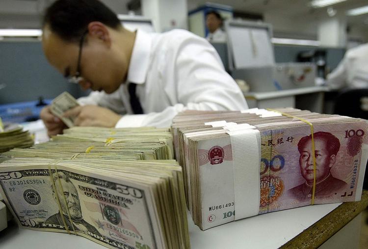 Valutastrid. Den kinesiske valuta, renminbi, er for billig i forhold til dollaren, og derved får kineserne en konkurrencefordel, mener USA. (Arkivfoto) 