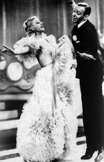 Depression. I 1930'ernes USA  gik man enten i biografen og så Ginger Rogers og Fred Astaire danse sorgløst  af sted i 'Swing Time' eller man gik i  hundene. Foto fra bogen: RKO Radio  Pictures Inc. 