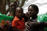 Genforenet. Drengen Charles Nadege blev i går forenet med to af sine slægtninge. Det skete i SOS Children's Village i Port-au-Prince. 