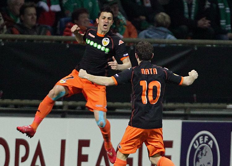 målhumør. David Villa scorede et såkaldt uægte hattrick for Valencia mod Werder Bremen. 