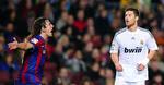 klassikeren. FC Barcelonas Carles Puyol lader vreden gå ud over Real Madrids Xabi Alonso i det første opgør mellem de to storklubber i denne sæson. Arkivfoto. 