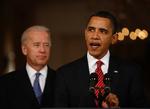 Sejr. Præsident Barack Obama sammen med vicepræsident Joe Biden efter afstemningen i Repræsentanternes Hus. 