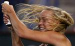 oversidder. I Miami er der lige som i Indian Wells 3,5 mio. kroner og halvdelen til den tabende finalist, der i søndags var Caroline Wozniacki. Arkivfoto. 