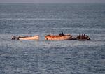 sørøveri. Somaliske joller bliver undersøgt af den internationale flåde ud for Somalia tidligere på måneden. Indsatsen har tæmmet piraterne - og de danske rederier prøver nu at  uddanne unge somaliere til en mere fredelig karriere. 