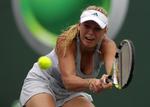 feberkamp. Over to timer var Caroline Wozniacki om at besejre russeren Maria Kirilenko. 